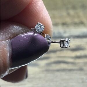 14kt white gold .12 ct. each diamond stud earrings